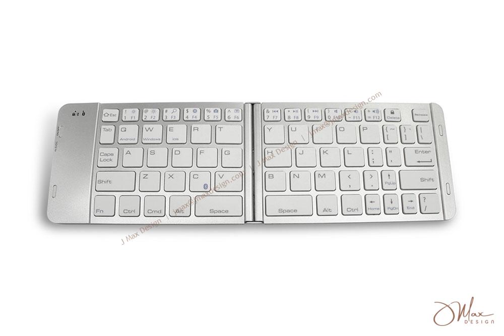 Silver BT folding keyboard with 66 white keys Foldable Bluetooth keyboard in silver