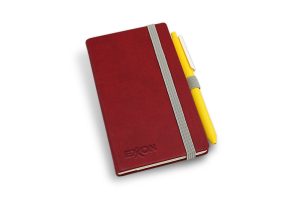 Hard cover notepad with elastic band closure and ball pen