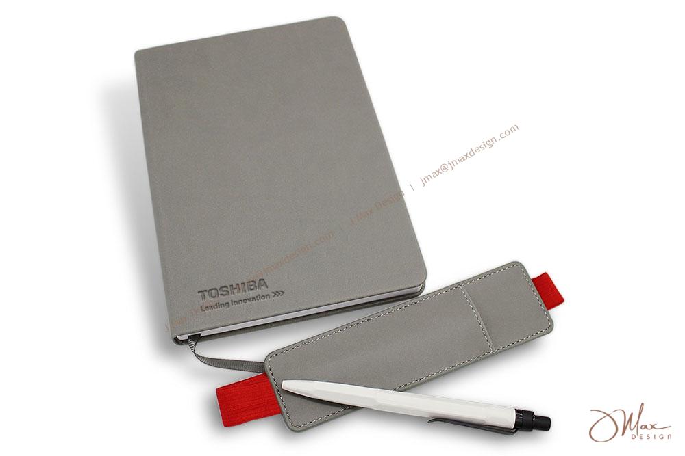 Hardcover notepad with a removable pen pouch and ball pen