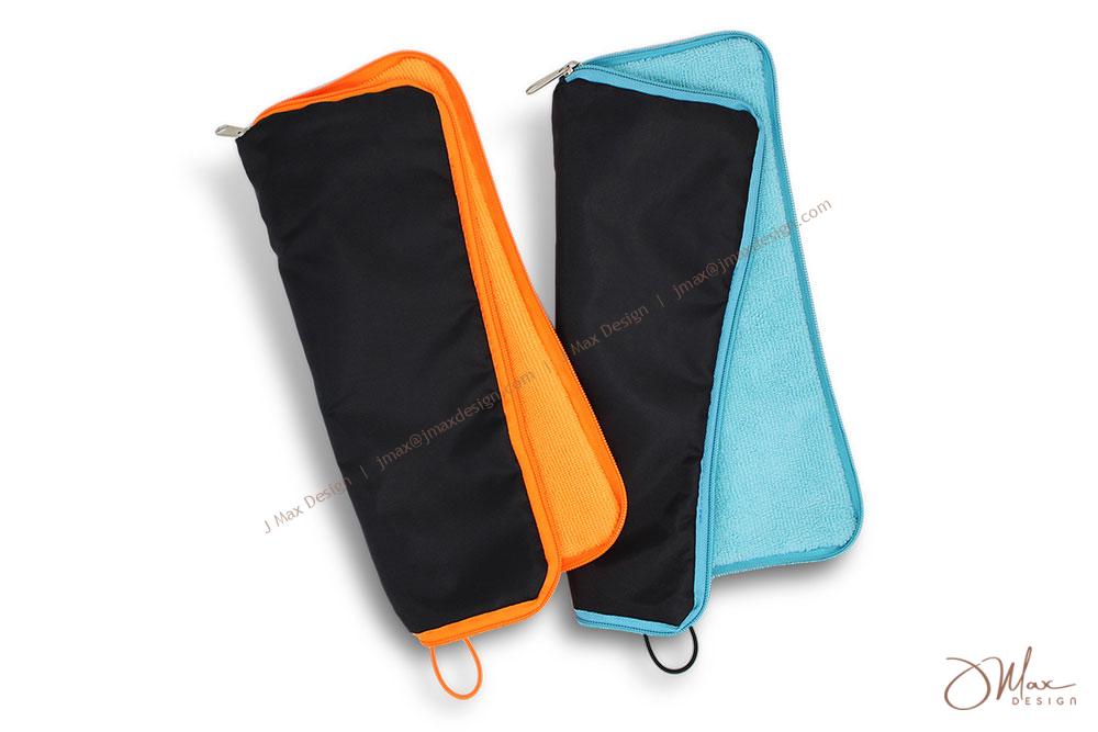 Water absorbent umbrella pouches Two Water absorbent umbrella pouches in orange and orange