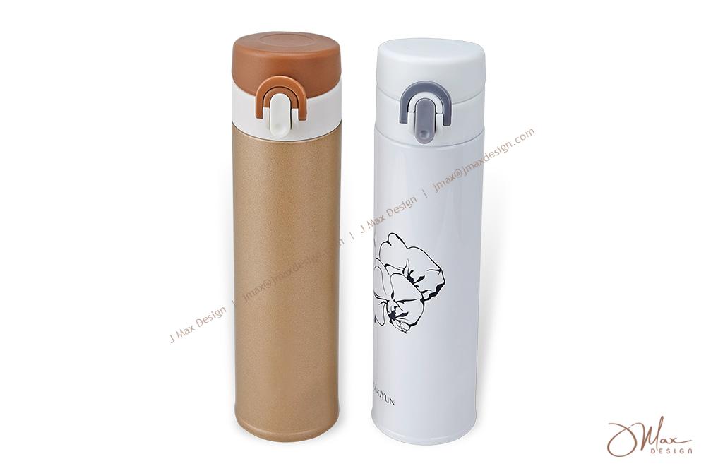 Thermal tumbler in gold and white colors Thermal tumbler with one push button