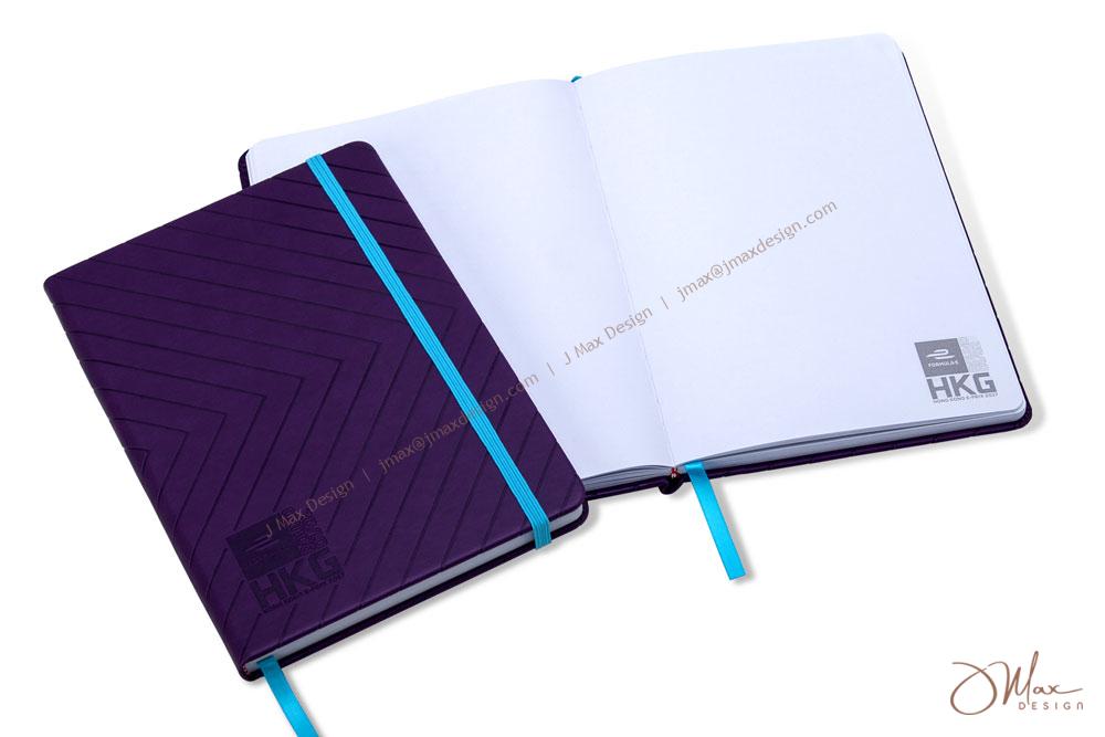 Full bleed embossed covers of Notepad Notepad with elastic band closure