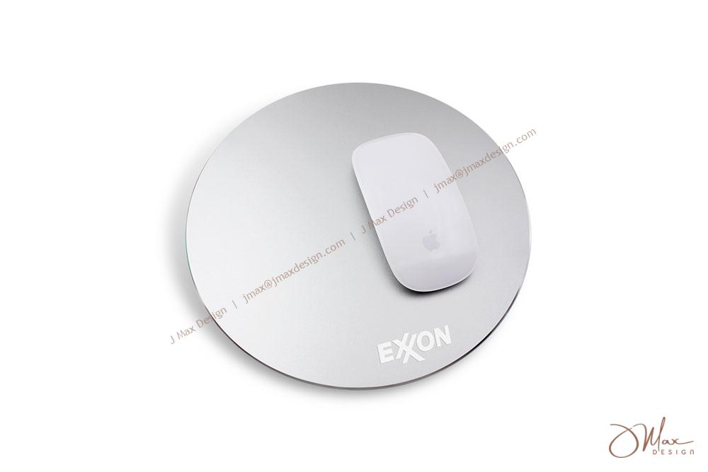 Round metal mouse pad with Apple magic mouse
