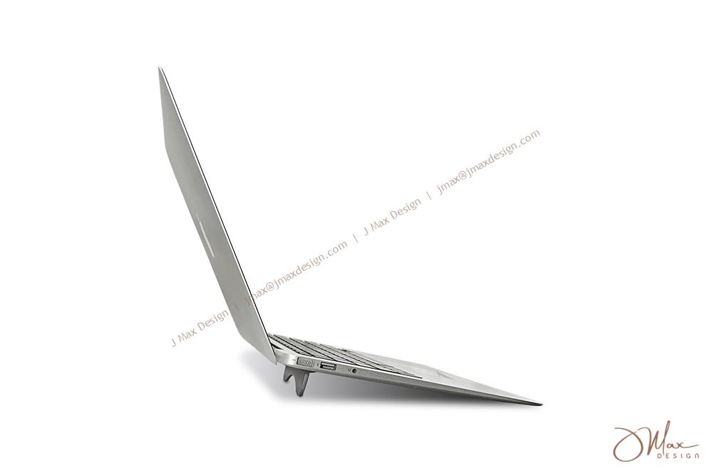 Side view of MBA and laptop stand Side view of MacBook with laptop stand