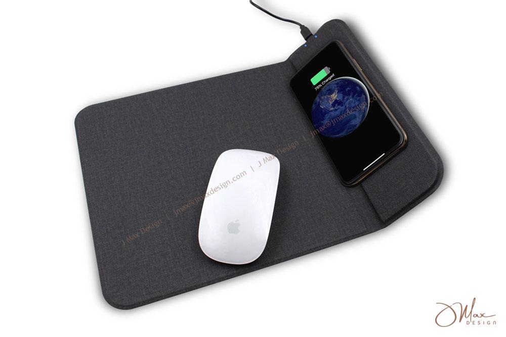 Cell phone charging on a mouse pad