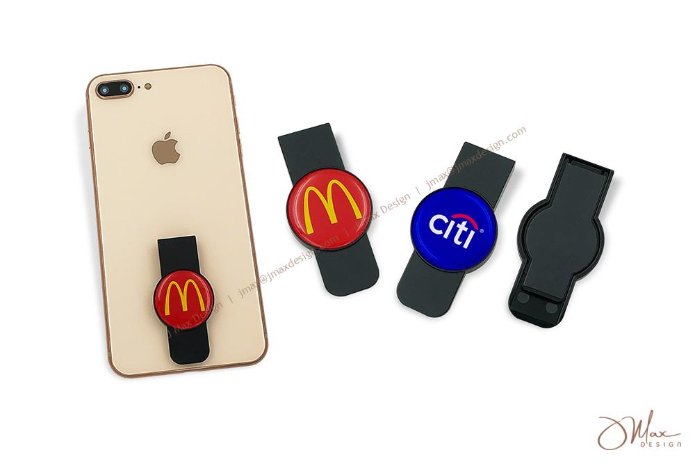 A folding stand stuck on the back of the cell phone