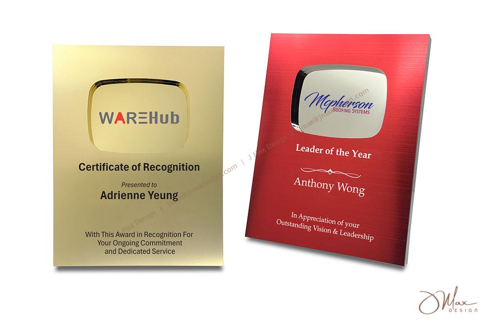 Two customizable award plaques in gold and red finishes, featuring engraved text and logos for recognition, leadership, and service appreciation.